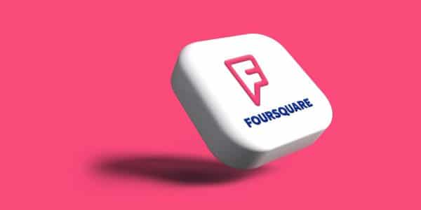 a white dice with the word foursquare on it